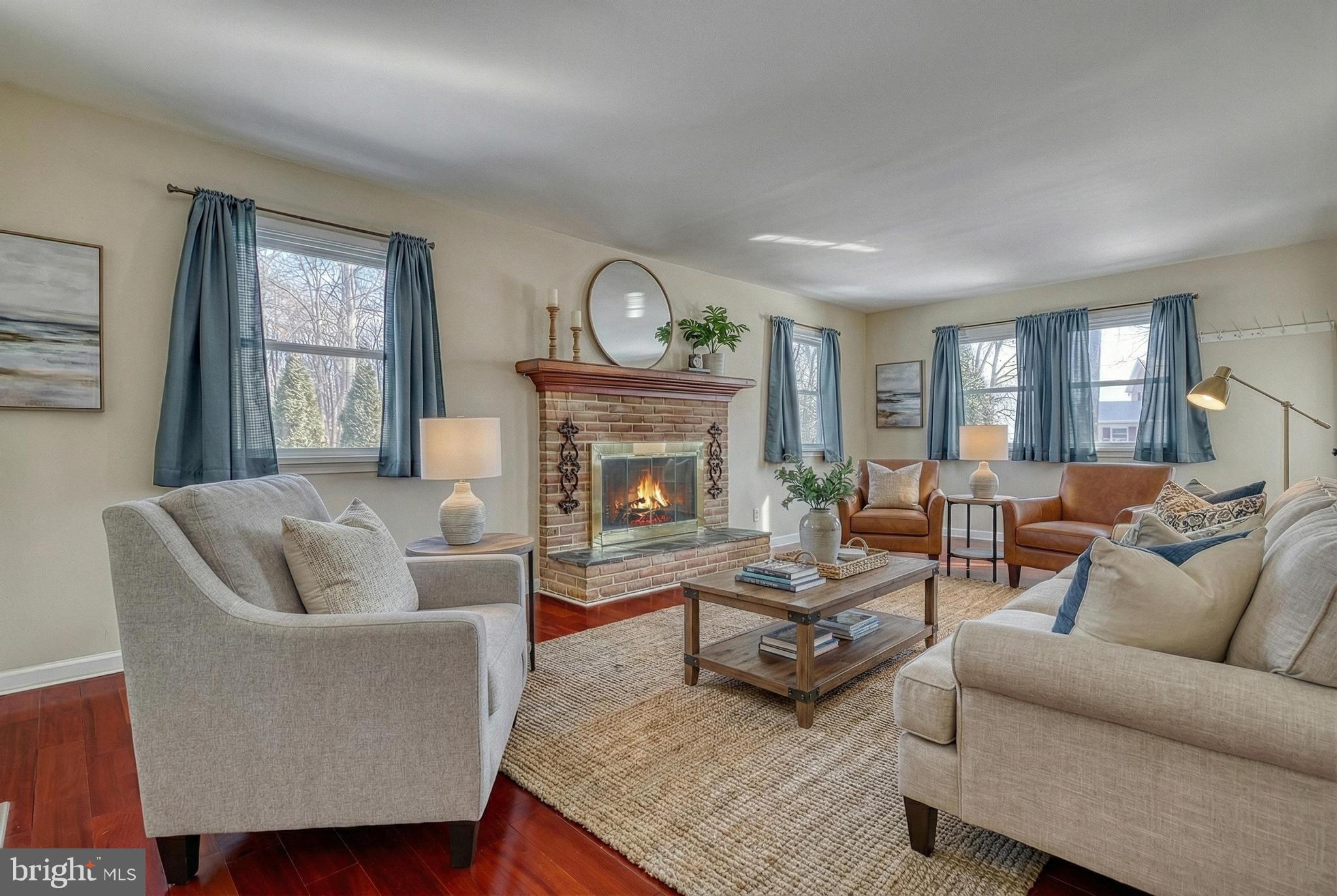 809 Flintlock Ridge Road Mechanicsburg, PA 17055 - Photo 14 of 46 a living room with furniture and a fireplace