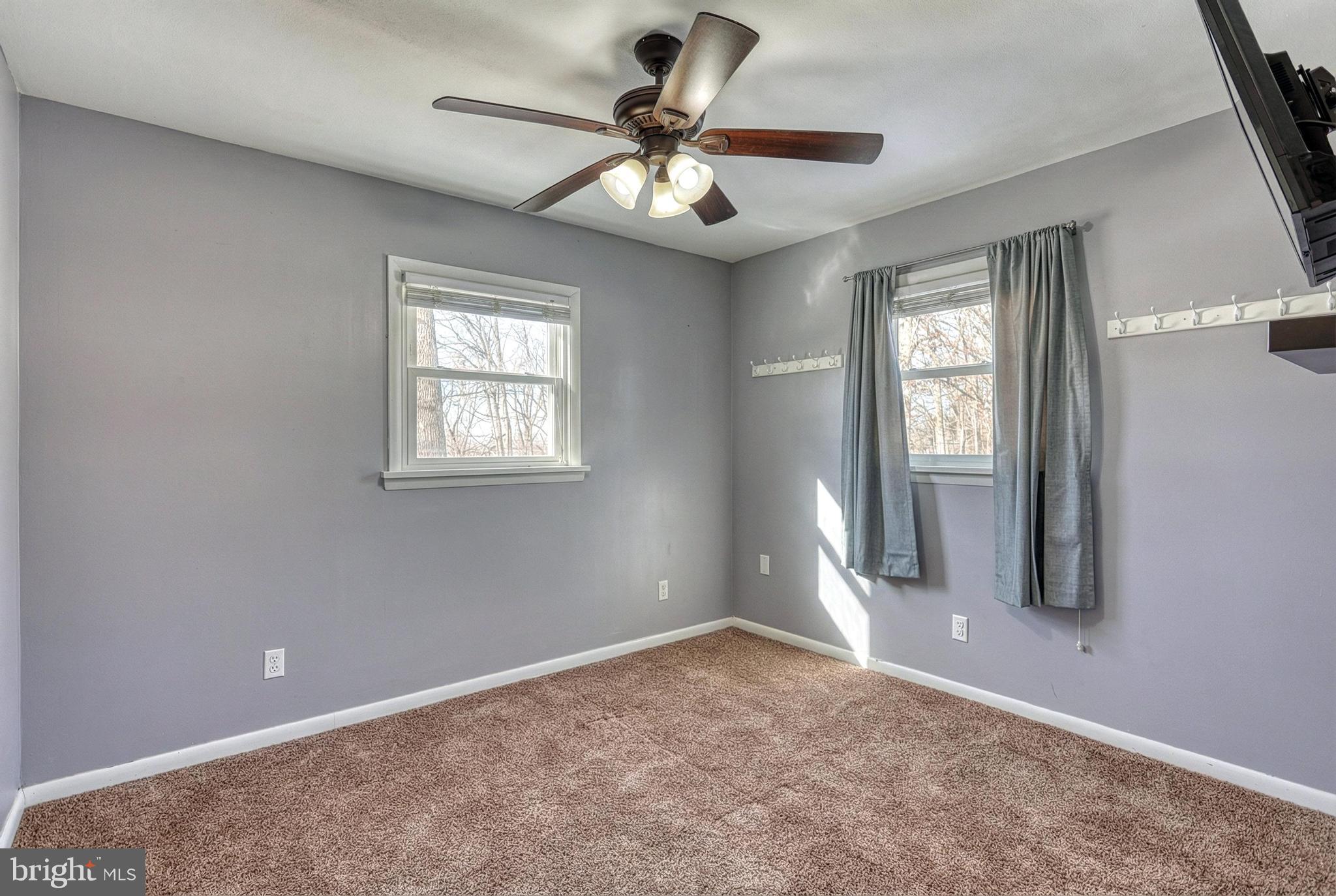 809 Flintlock Ridge Road Mechanicsburg, PA 17055 - Photo 29 of 46 a view of an empty room with a window