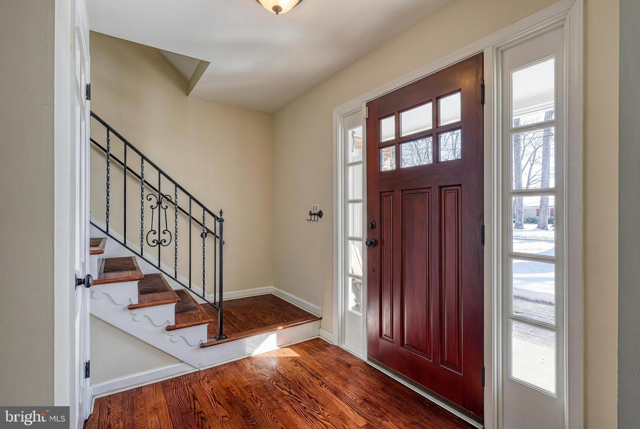 809 Flintlock Ridge Road Mechanicsburg, PA 17055 - Photo 3 of 46 a view of front door with dining room and stairs