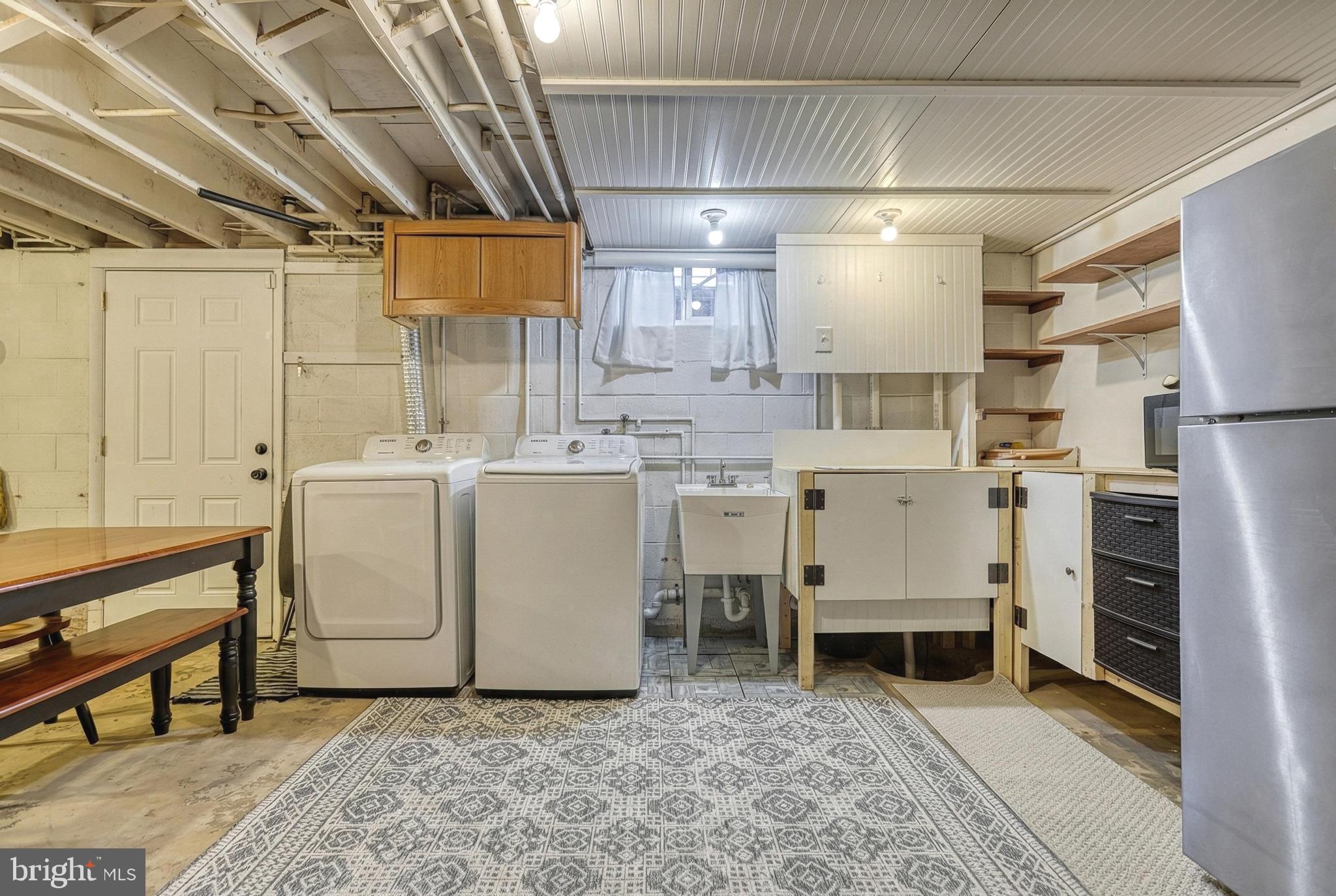 809 Flintlock Ridge Road Mechanicsburg, PA 17055 - Photo 33 of 46 a utility room with cabinets