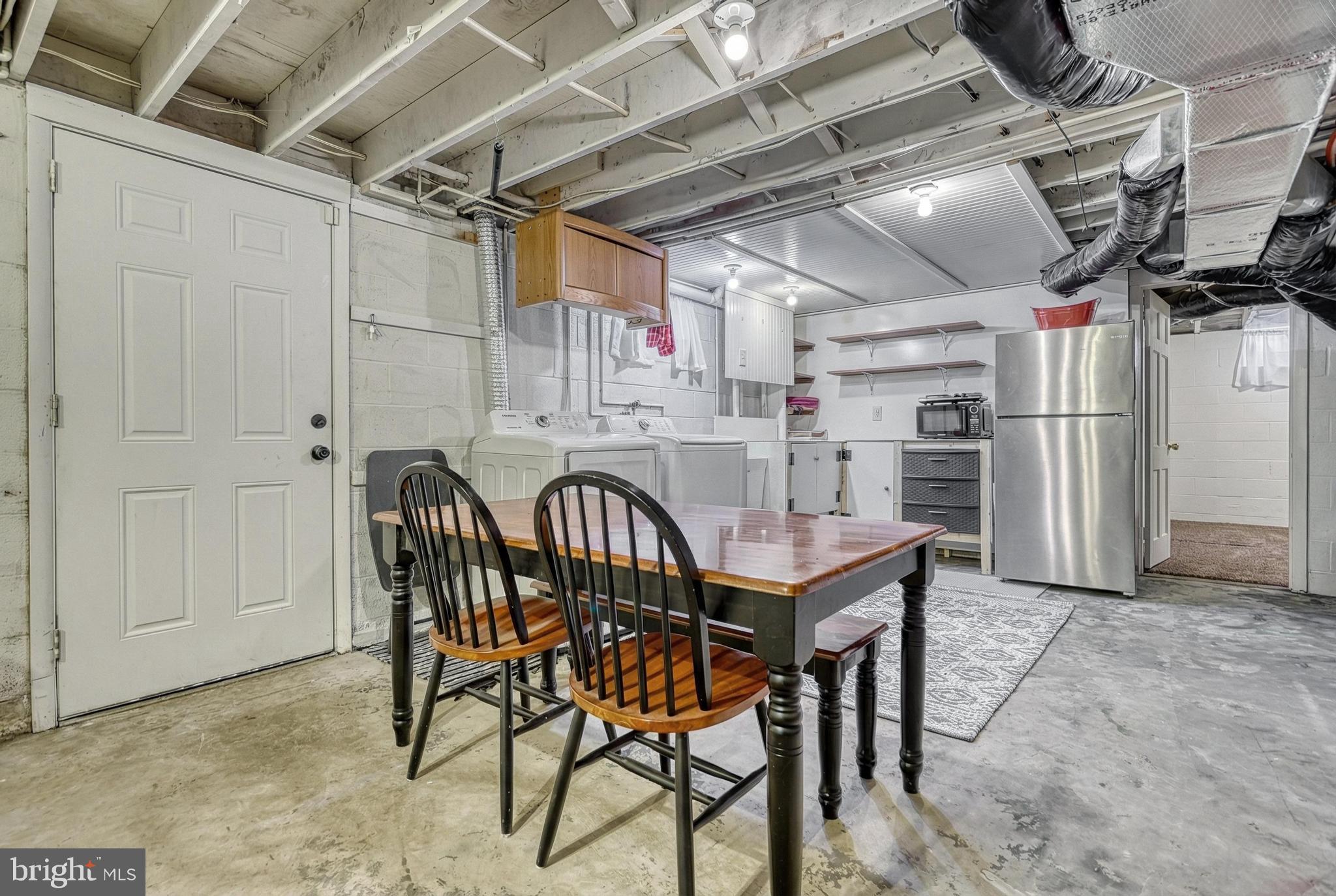 809 Flintlock Ridge Road Mechanicsburg, PA 17055 - Photo 34 of 46 a utility room with lots of wooden furniture