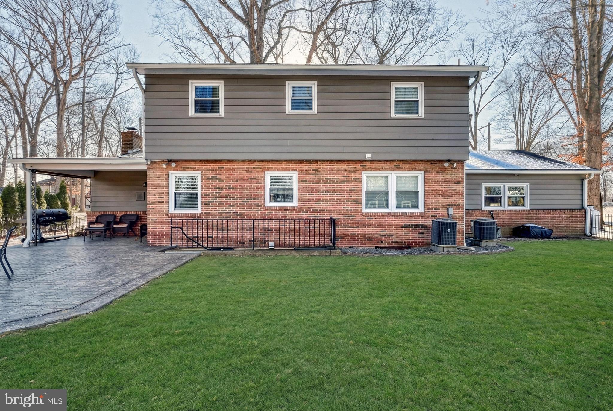 809 Flintlock Ridge Road Mechanicsburg, PA 17055 - Photo 39 of 46 a view of a house with a backyard