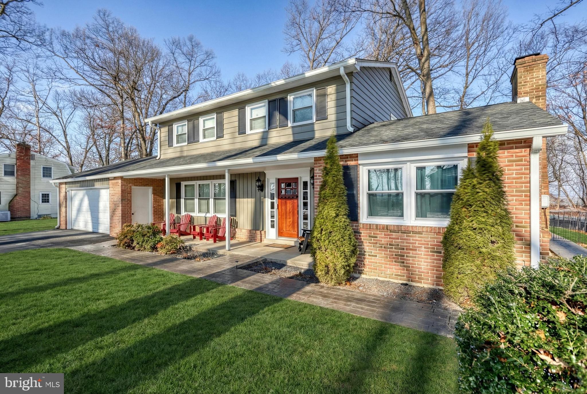 809 Flintlock Ridge Road Mechanicsburg, PA 17055 - Photo 6 of 20 front view of a house with a yard
