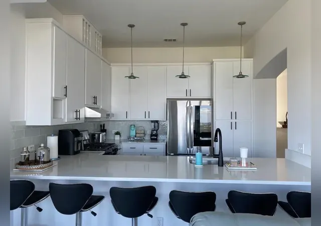 a bedroom with bed and window