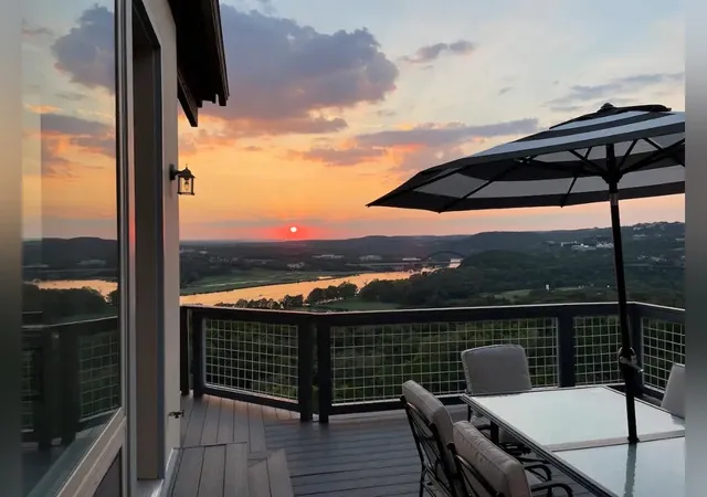 a view of a balcony with chair and wooden floor