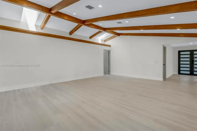 a bathroom with a toilet sink and shower