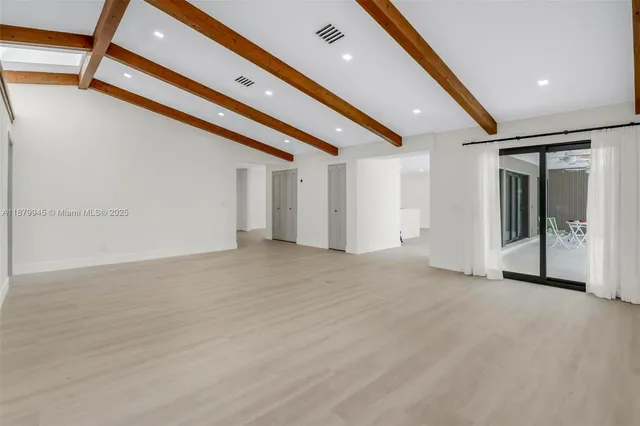 a bathroom with a toilet sink and shower