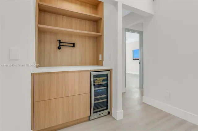 a view of an empty walk in closet