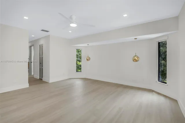 a view of a swimming pool with a porch