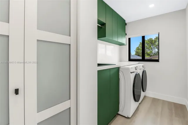 a view of a lake with houses in the back