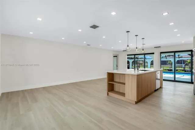 a bathroom with a bathtub and a sink