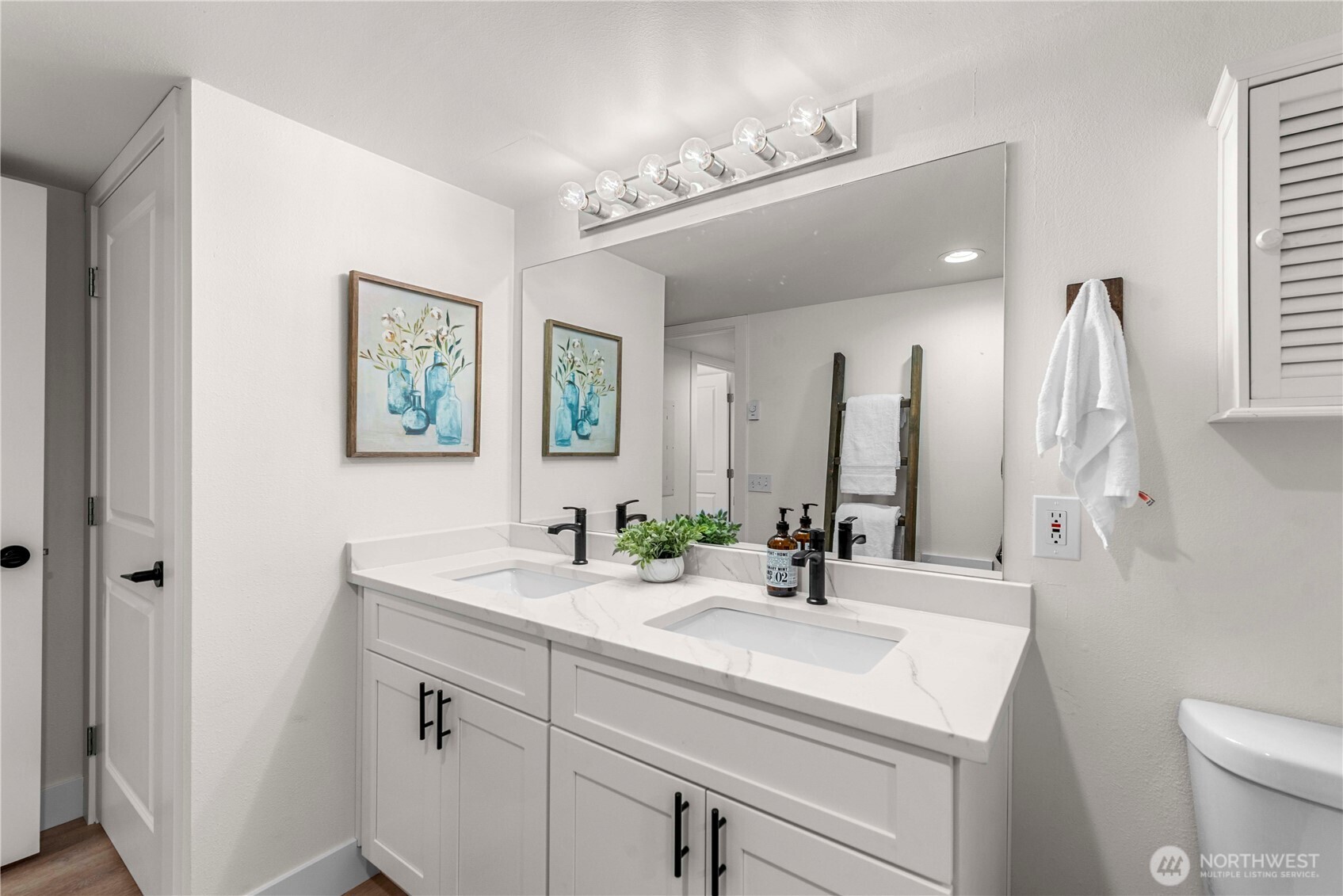 8348 Main Street, Unit 6 Peshastin, WA 98847 - Photo 27 of 34 a bathroom with a sink and a mirror
