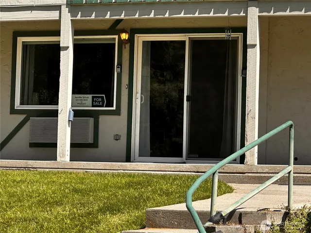 a view of swimming pool with patio