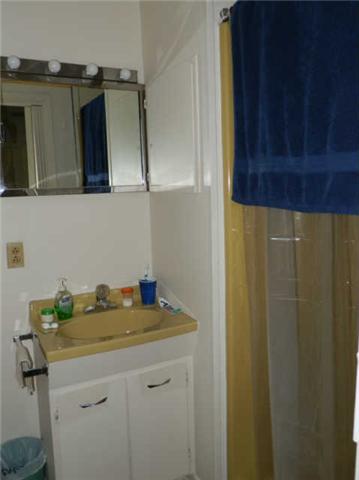 2100 Post Road Clarksville, TN 37043 - Photo 12 of 19 a bathroom with a sink and a mirror