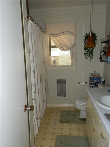 2100 Post Road Clarksville, TN 37043 - Photo 9 of 19 a bathroom with a granite countertop sink toilet and shower