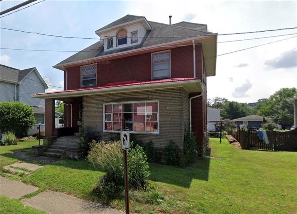 216 East Pike Street Houston, PA 15342 - Photo 2 of 10 a house view with a garden space