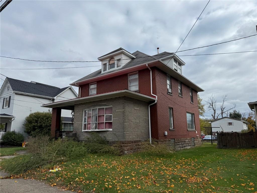 216 East Pike Street Houston, PA 15342 - Photo 3 of 10 a view of a house with a yard
