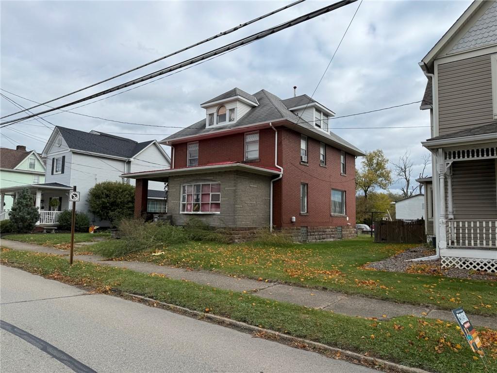216 East Pike Street Houston, PA 15342 - Photo 4 of 10 a view of a house with a yard