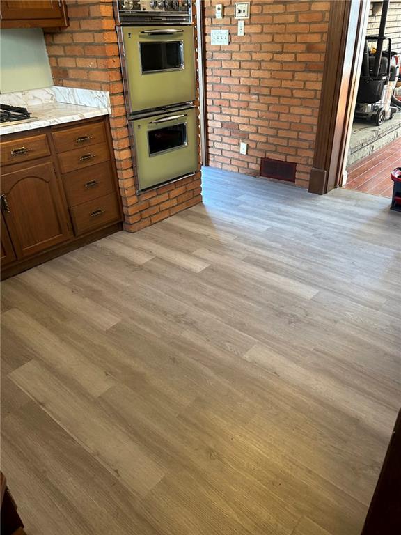 216 East Pike Street Houston, PA 15342 - Photo 8 of 10 a view of a kitchen with a sink and a microwave