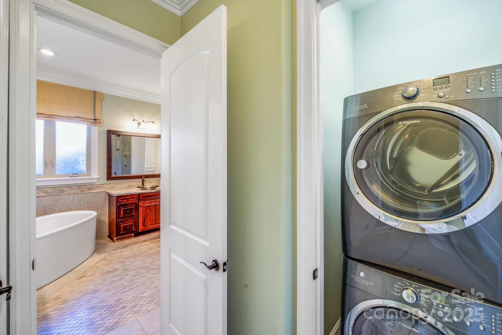 126 Forsythia Lane Tega Cay, SC 29708 - Photo 19 of 32 a view of walk in closet and bedroom