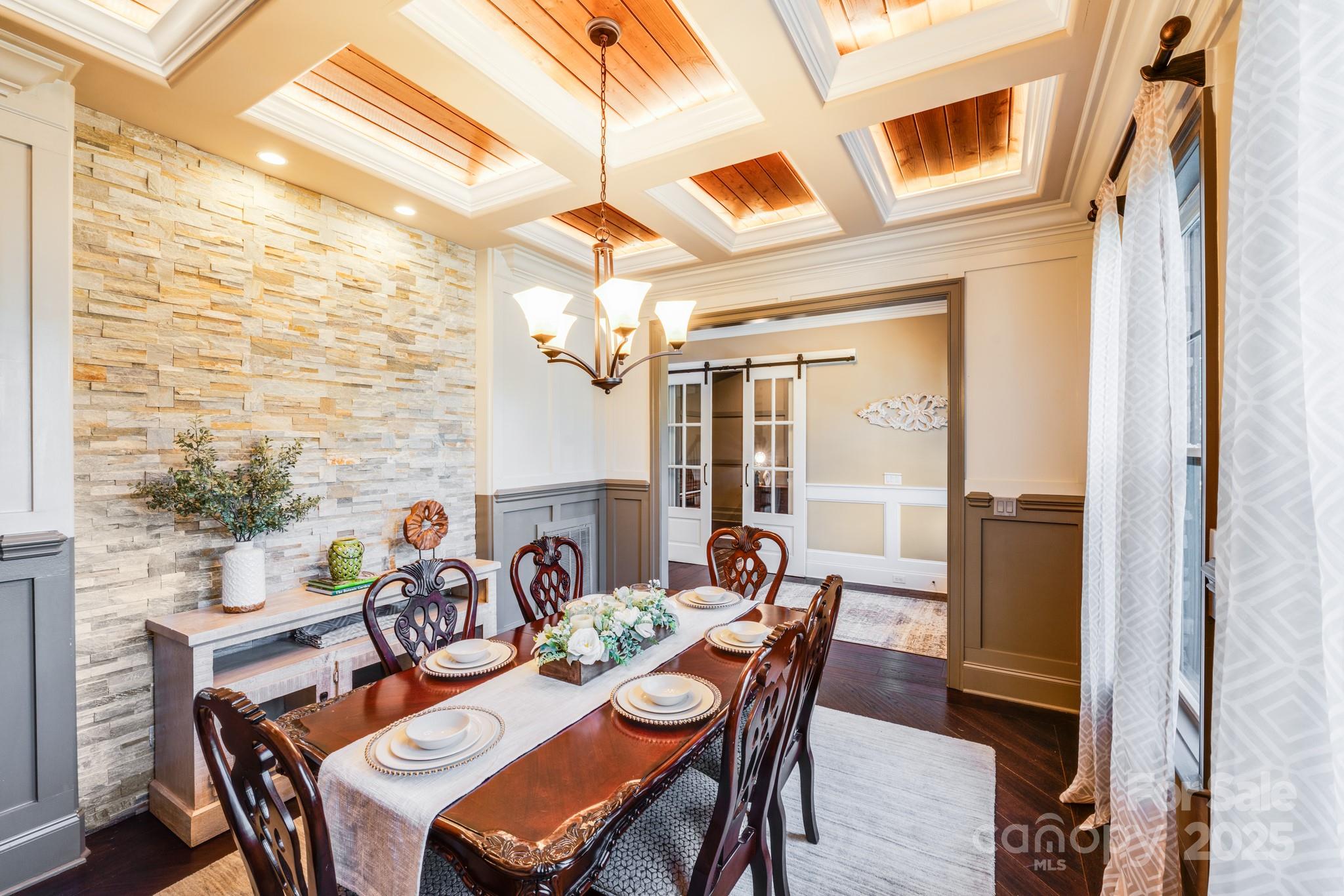 126 Forsythia Lane Tega Cay, SC 29708 - Photo 6 of 32 a view of a dining room with furniture window and outside view