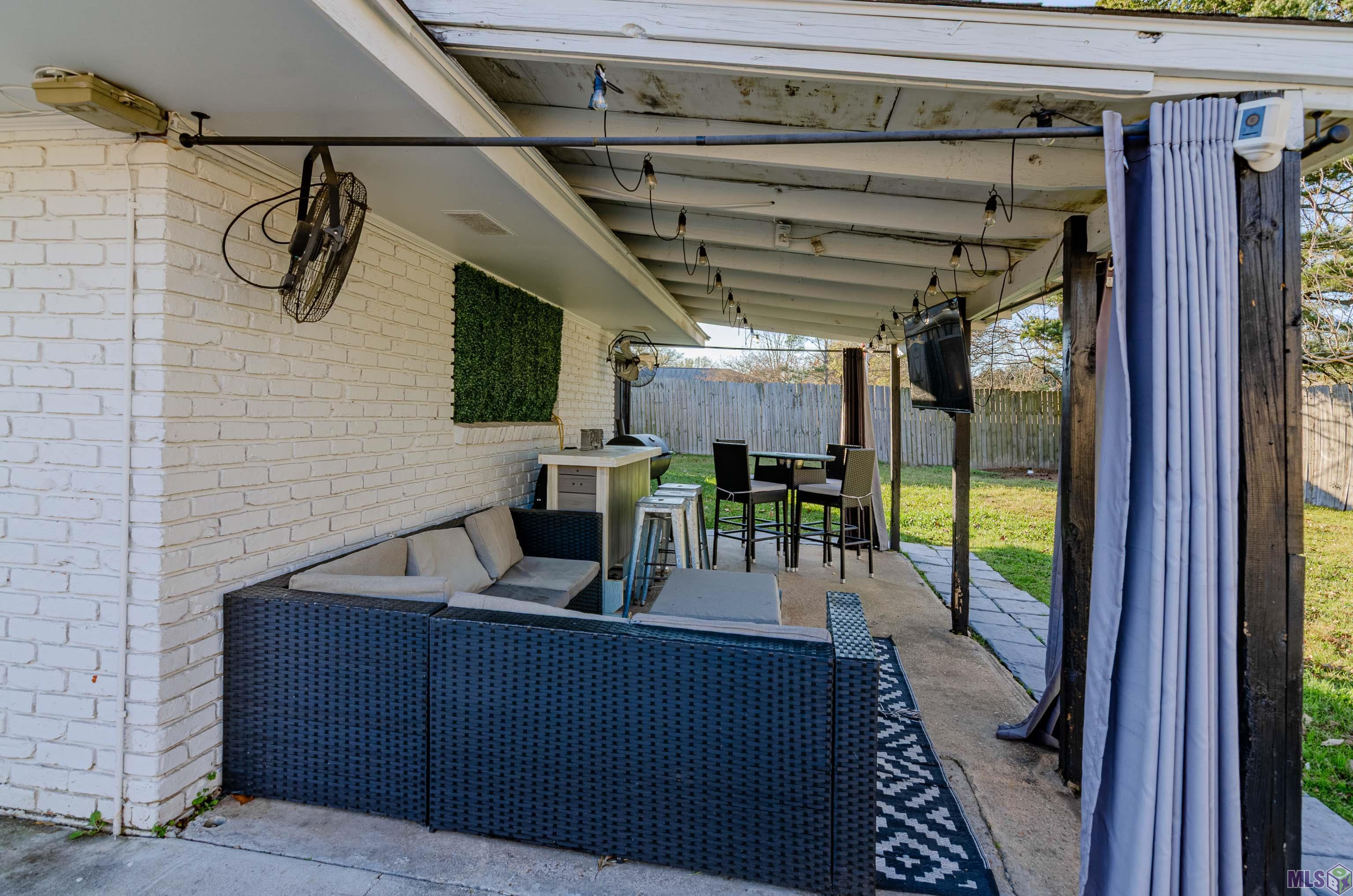 12379 Fairhaven Drive Baton Rouge, LA 70815 - Photo 20 of 24 Covered Patio for Outdoor Cooking and Seating