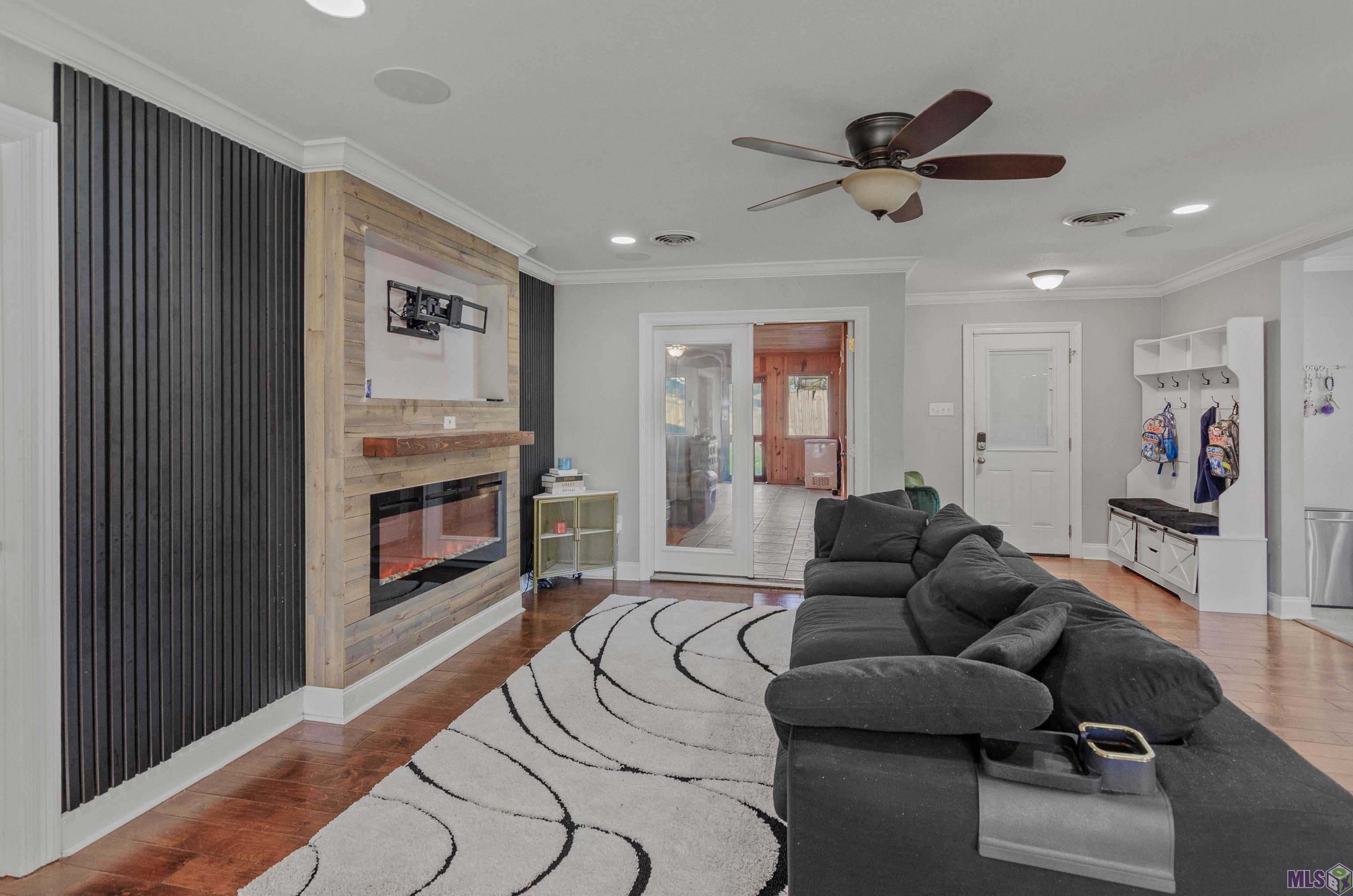 12379 Fairhaven Drive Baton Rouge, LA 70815 - Photo 9 of 24 Den with Faux Fireplace