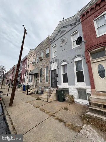 a view of a building with a street