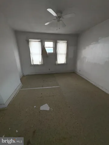 an empty room that has a window