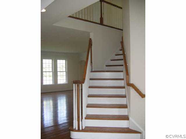 1213 Gravatt Way Midlothian, VA 23114 - Photo 3 of 9 a view of entryway and hall with wooden floor