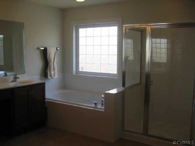1213 Gravatt Way Midlothian, VA 23114 - Photo 8 of 9 a bathroom with a sink and a mirror
