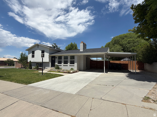 375 East 10560 South Sandy, UT 84070 - Photo 1 of 21 Contemporary-style residence with a contrasting light gray and white exterior