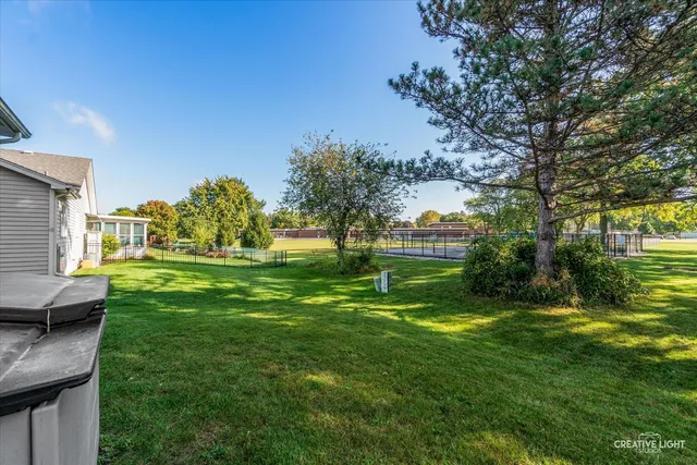 a view of a house with a big yard