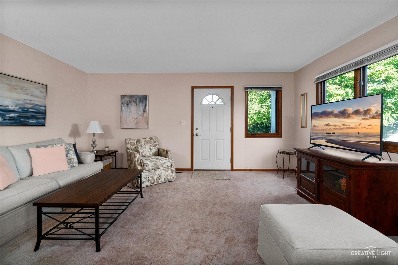 43 Juniper Drive North Aurora, IL 60542 - Photo 2 of 16 a living room with furniture and a flat screen tv