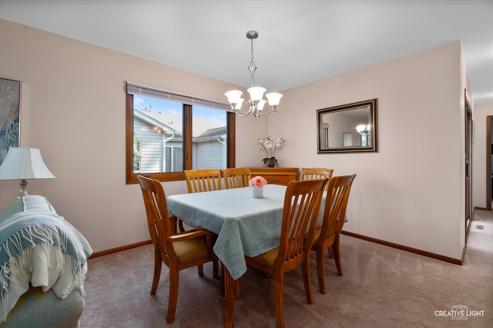 43 Juniper Drive North Aurora, IL 60542 - Photo 4 of 16 a view of a dining room with furniture and chandelier