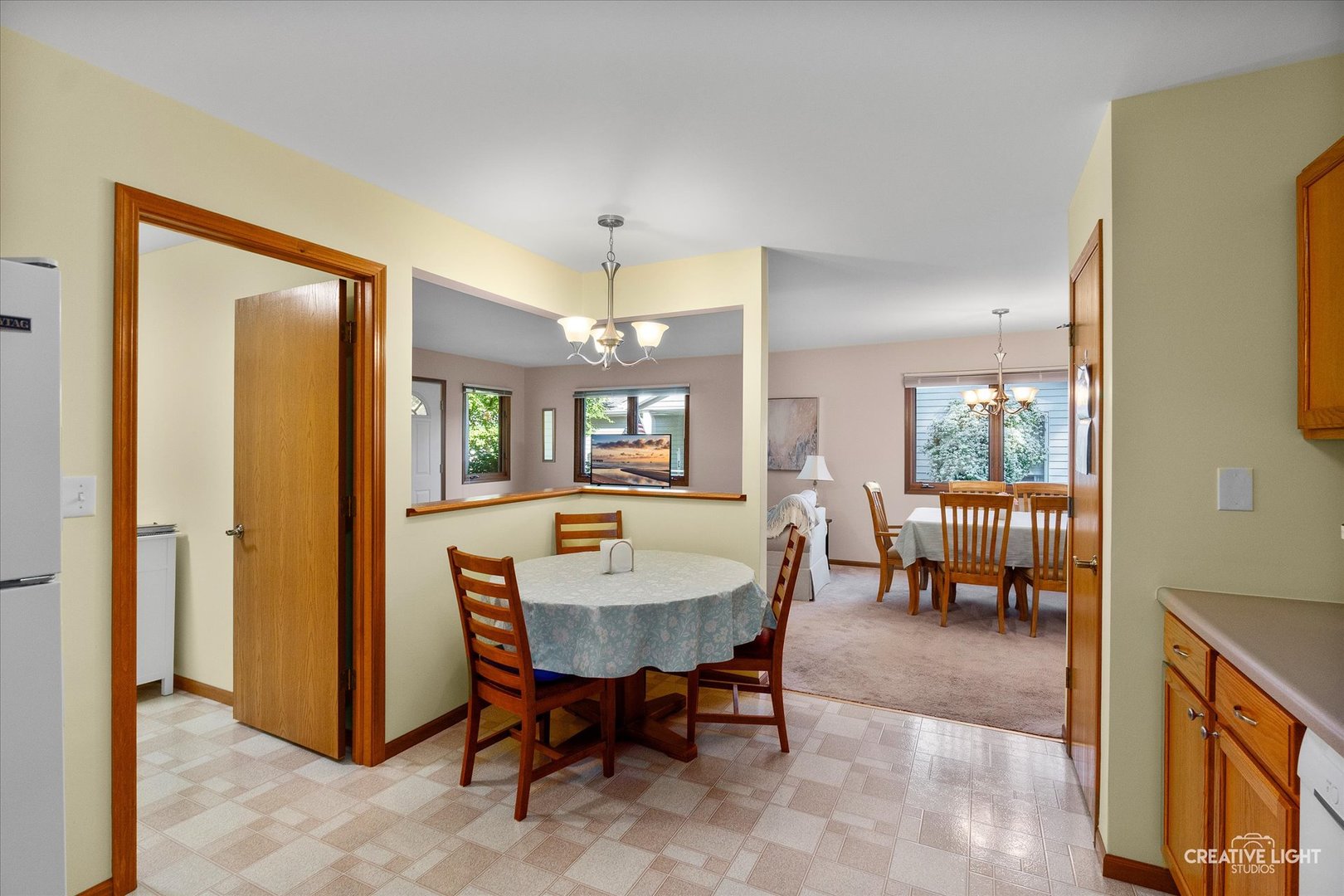 43 Juniper Drive North Aurora, IL 60542 - Photo 6 of 16 a dining room with furniture and a table