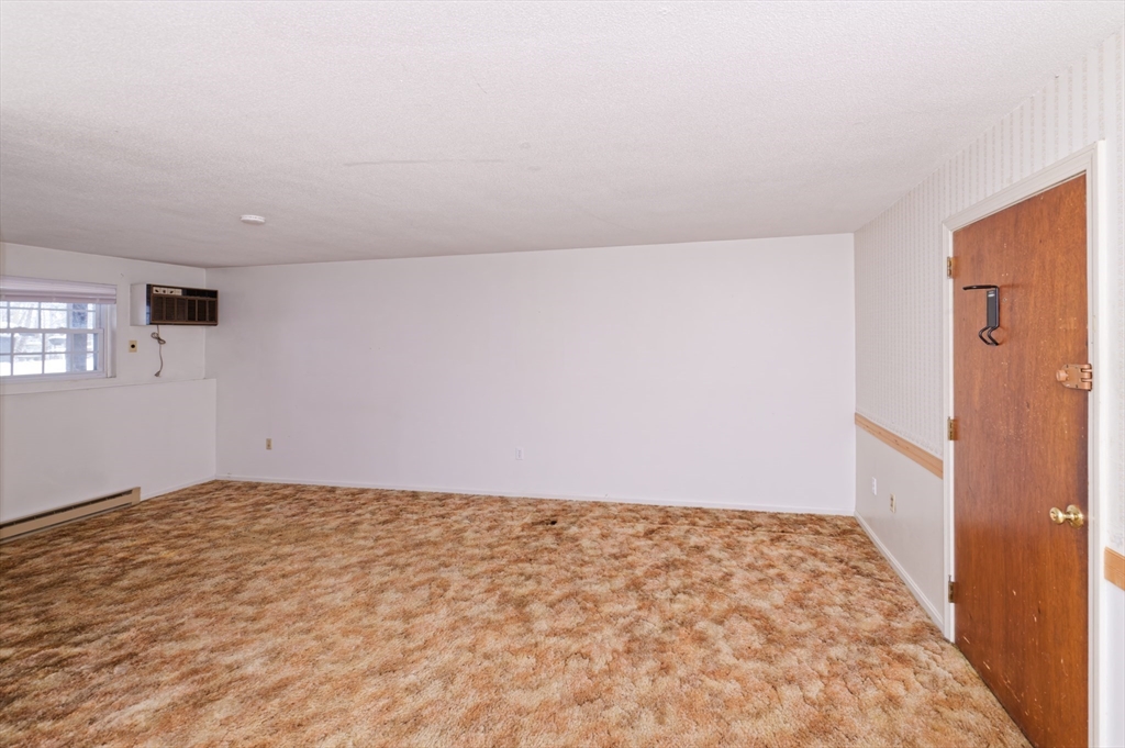 39 Pleasant Street, Unit B4 Northborough, MA 01532 - Photo 2 of 24 a view of an empty room