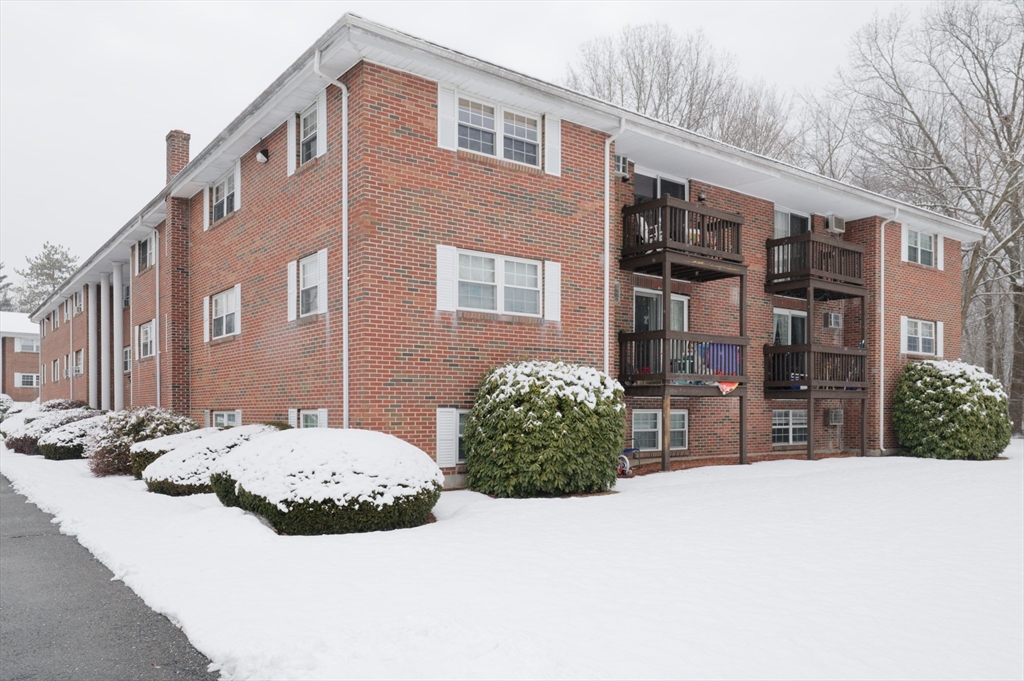 39 Pleasant Street, Unit B4 Northborough, MA 01532 - Photo 23 of 24 a view of a house with a stove