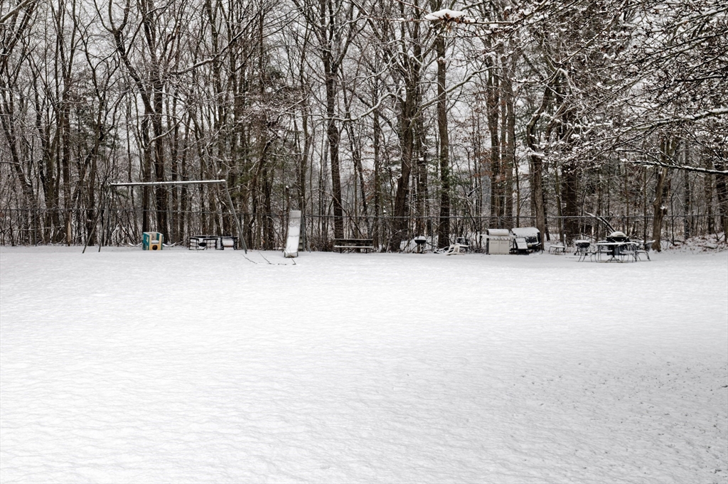 39 Pleasant Street, Unit B4 Northborough, MA 01532 - Photo 24 of 24 a view of outdoor space with wooden fence