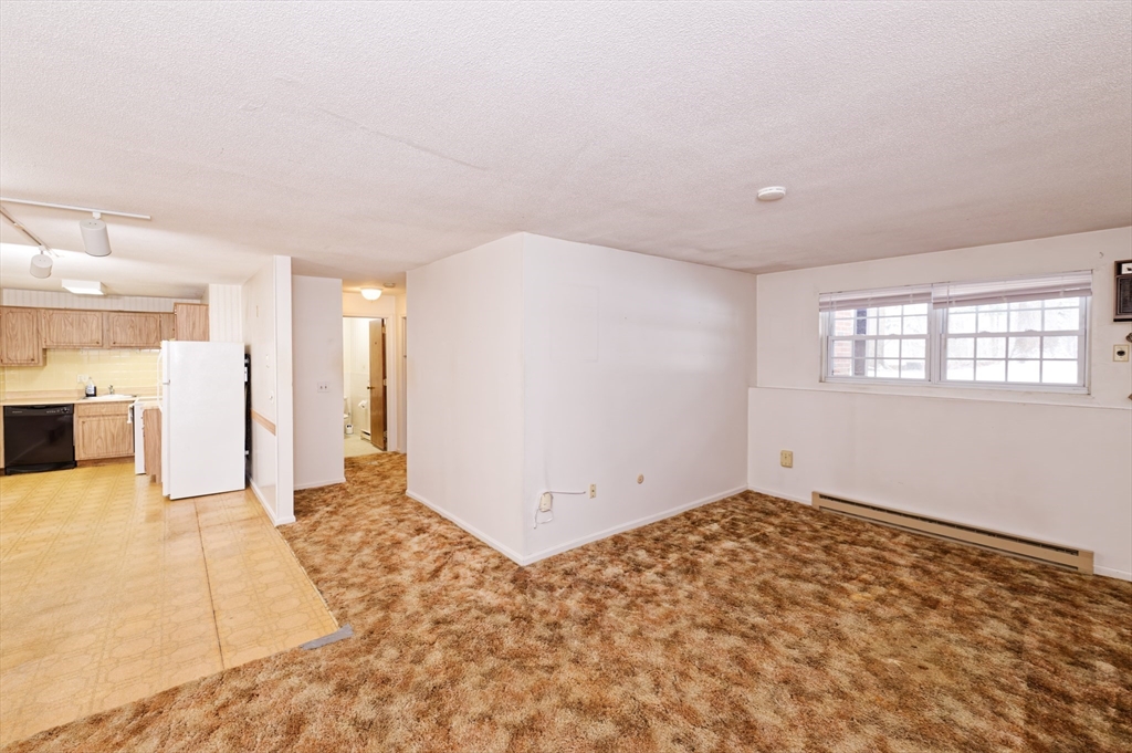 39 Pleasant Street, Unit B4 Northborough, MA 01532 - Photo 6 of 24 a view of an empty room