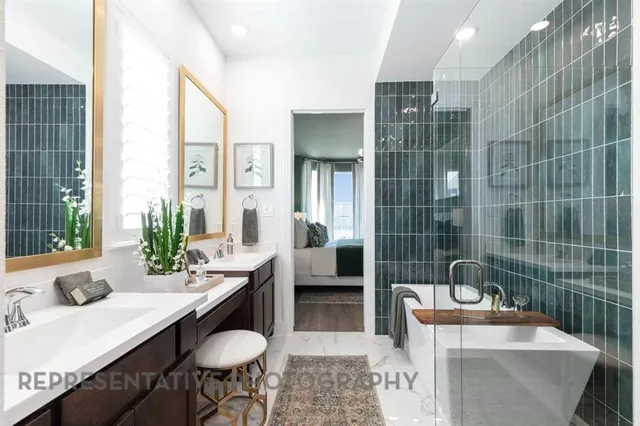 a bathroom with a tub sink and mirror