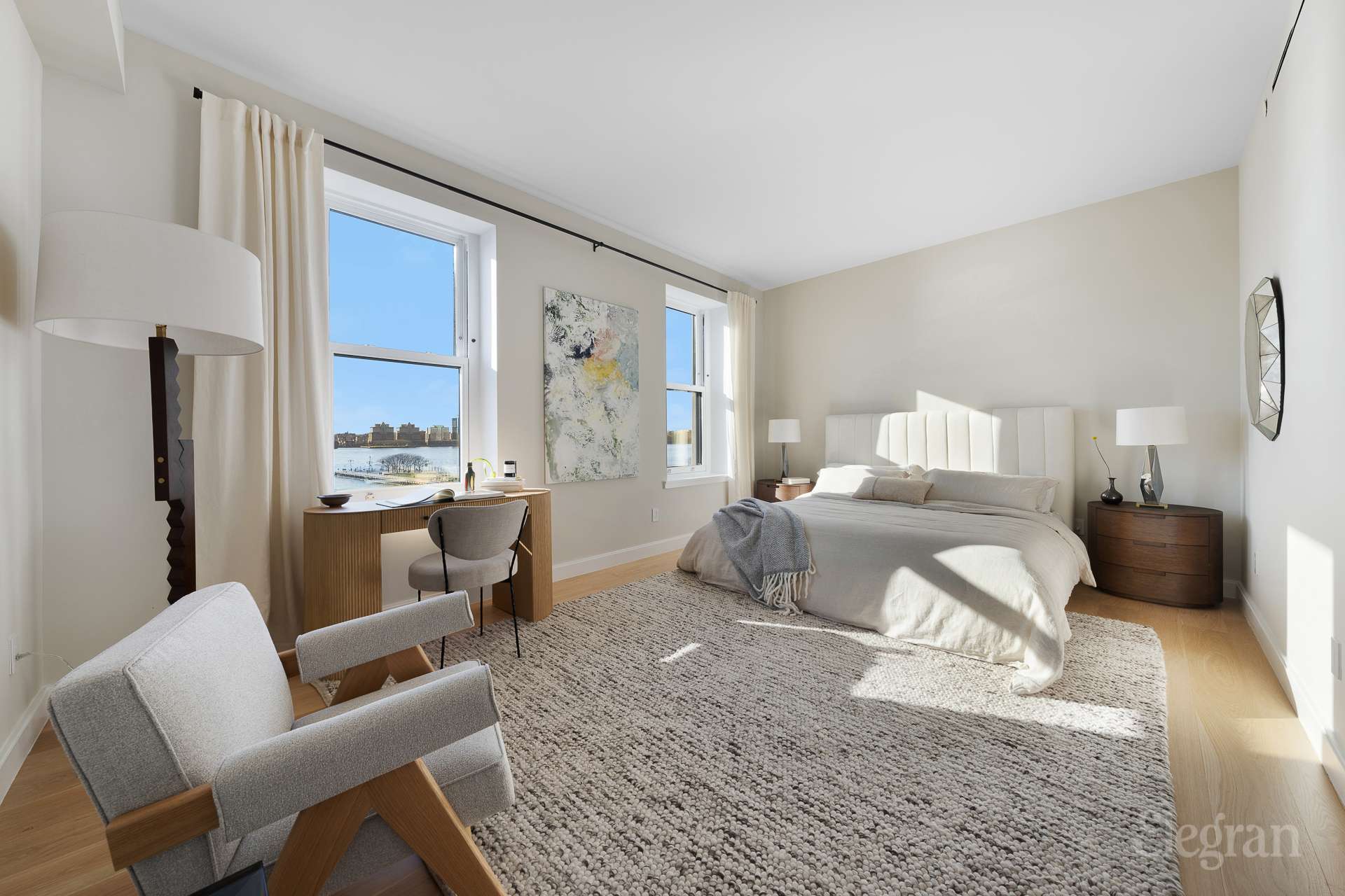 150 Barrow Street, Unit PHA Manhattan, NY 10014 - Photo 11 of 22 a living room with furniture and a large window