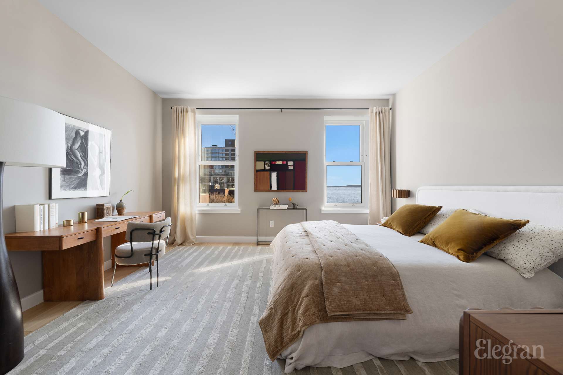 150 Barrow Street, Unit PHA Manhattan, NY 10014 - Photo 16 of 22 a bedroom with a bed and wooden floor