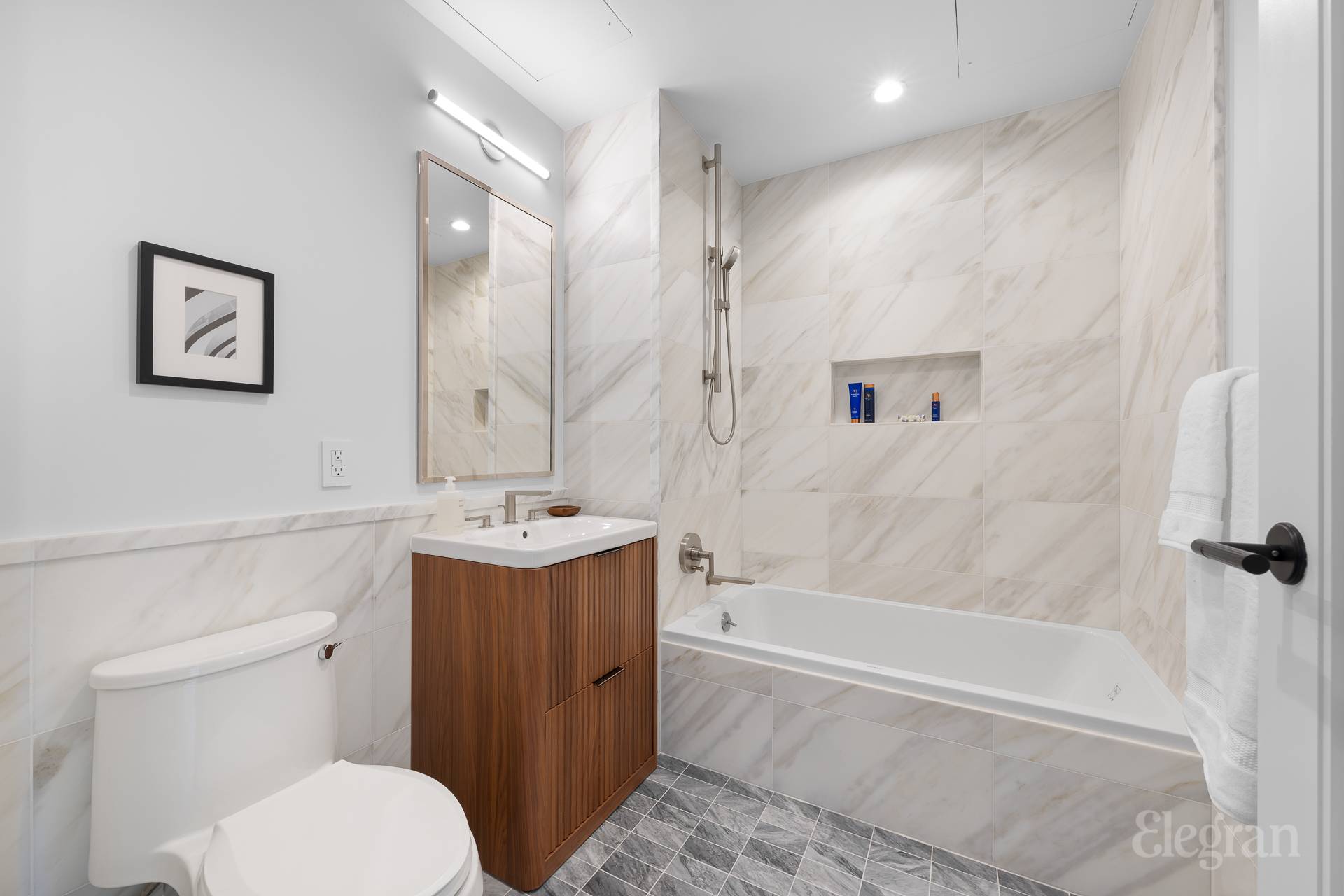 150 Barrow Street, Unit PHA Manhattan, NY 10014 - Photo 17 of 22 a bathroom with a sink a toilet and shower