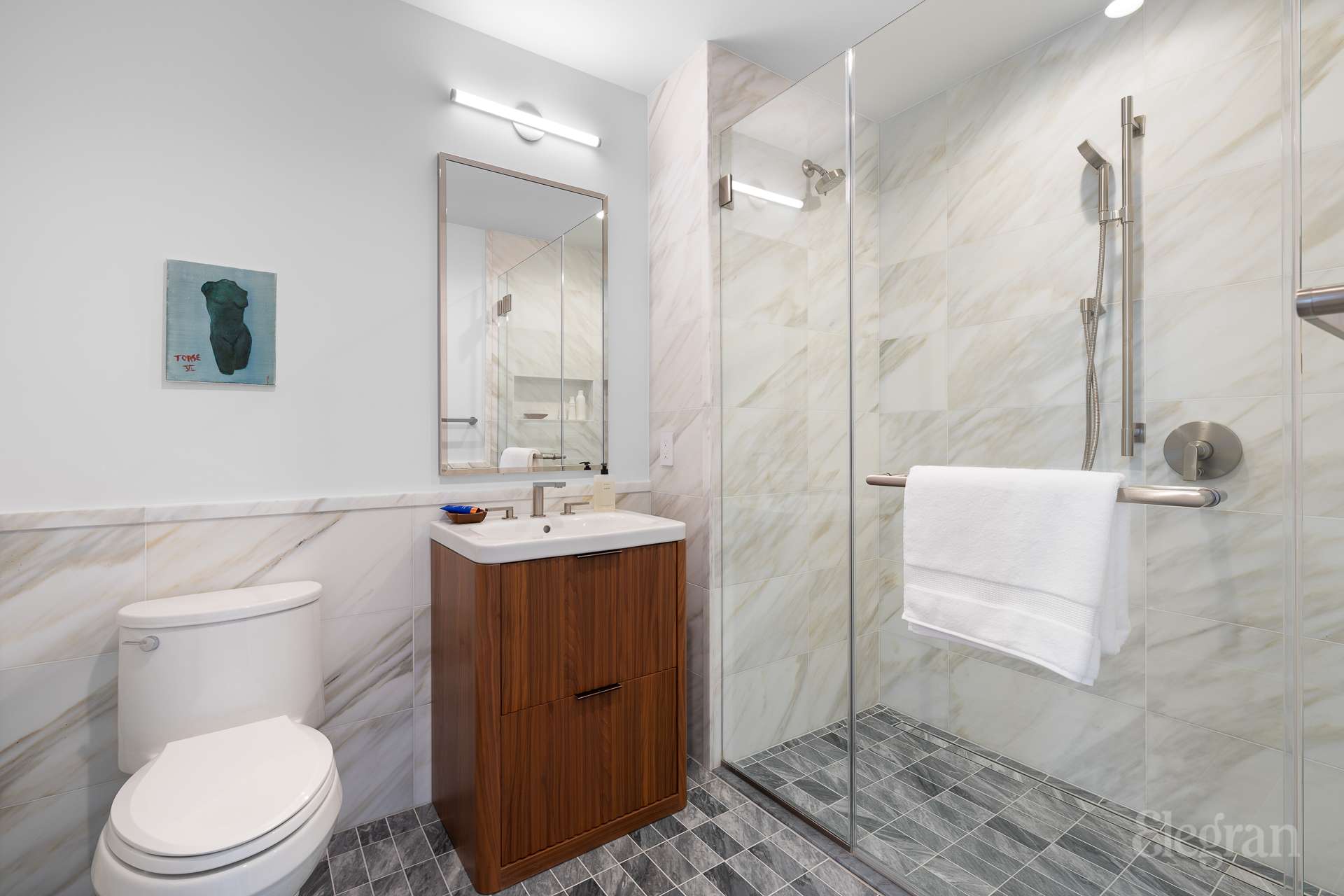 150 Barrow Street, Unit PHA Manhattan, NY 10014 - Photo 19 of 22 a bathroom with a sink a toilet and shower