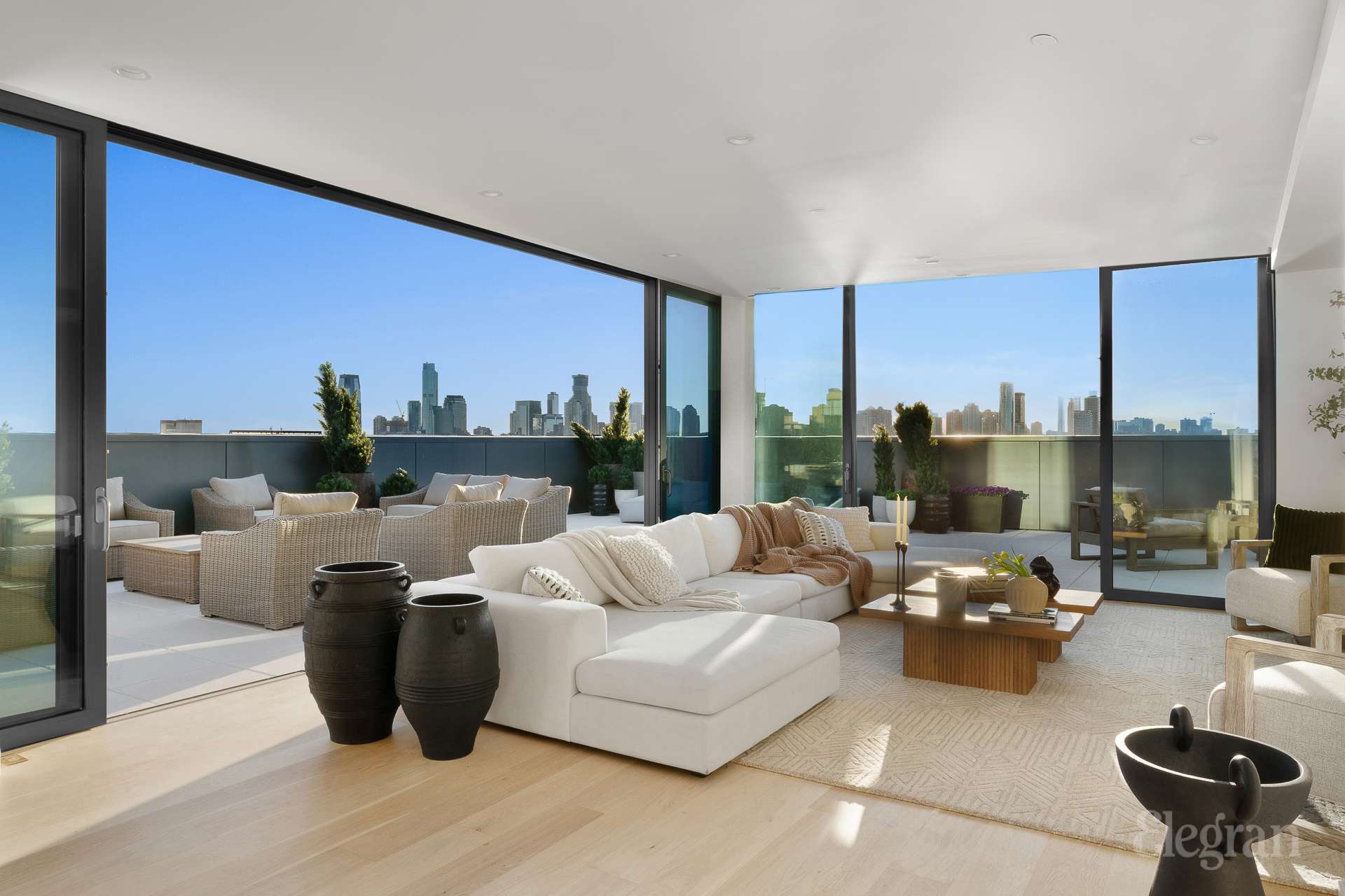 150 Barrow Street, Unit PHA Manhattan, NY 10014 - Photo 3 of 22 a living room with furniture large window and a table
