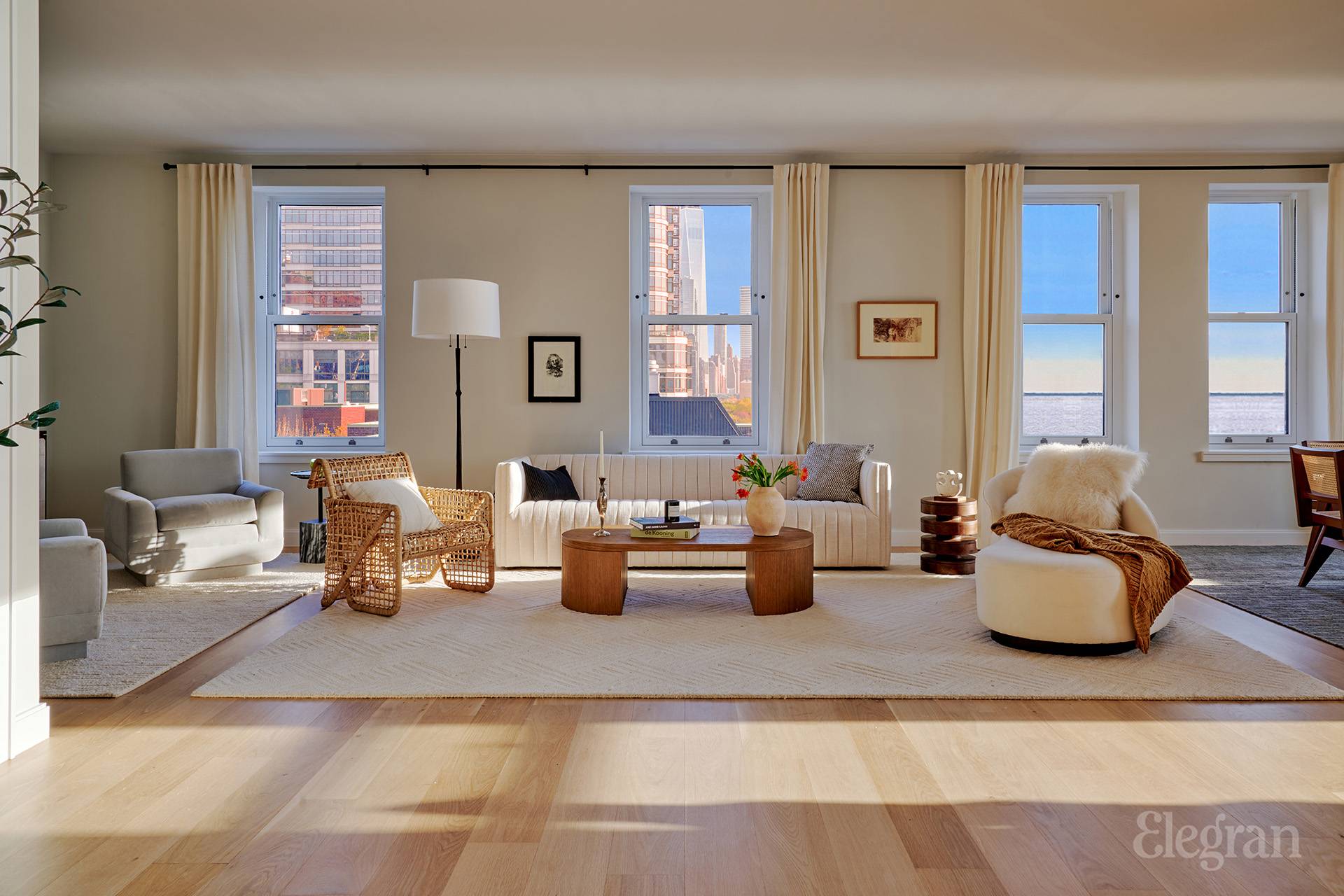 150 Barrow Street, Unit PHA Manhattan, NY 10014 - Photo 6 of 22 a living room with furniture and large windows