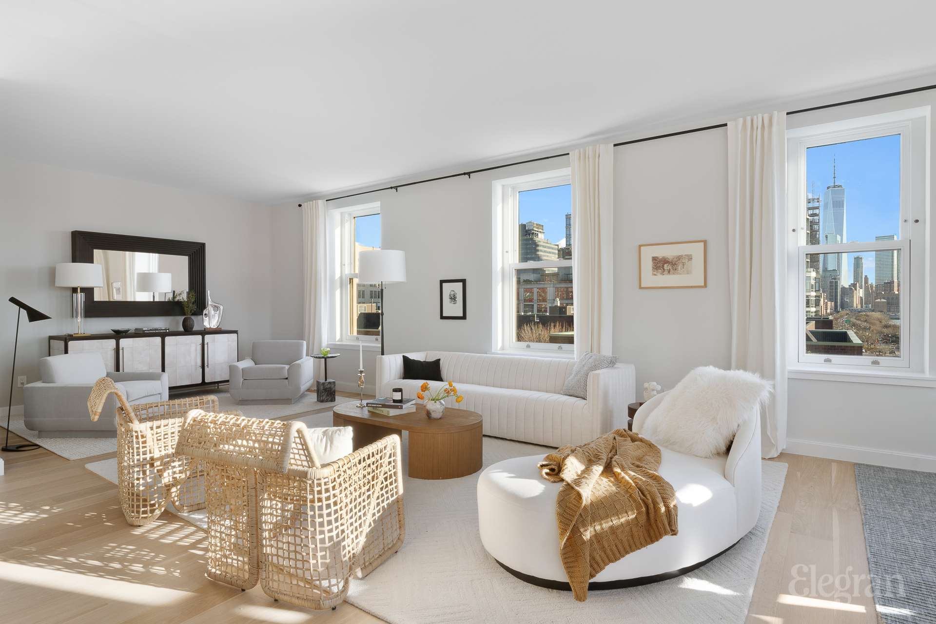 150 Barrow Street, Unit PHA Manhattan, NY 10014 - Photo 7 of 22 a living room with furniture and a flat screen tv