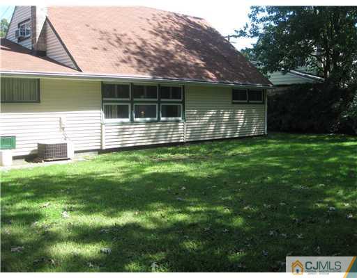 7 Ridge Road Old Bridge, NJ 08857 - Photo 14 of 15 a view of a house with a backyard