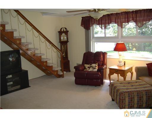 7 Ridge Road Old Bridge, NJ 08857 - Photo 4 of 15 a living room with furniture and a large window